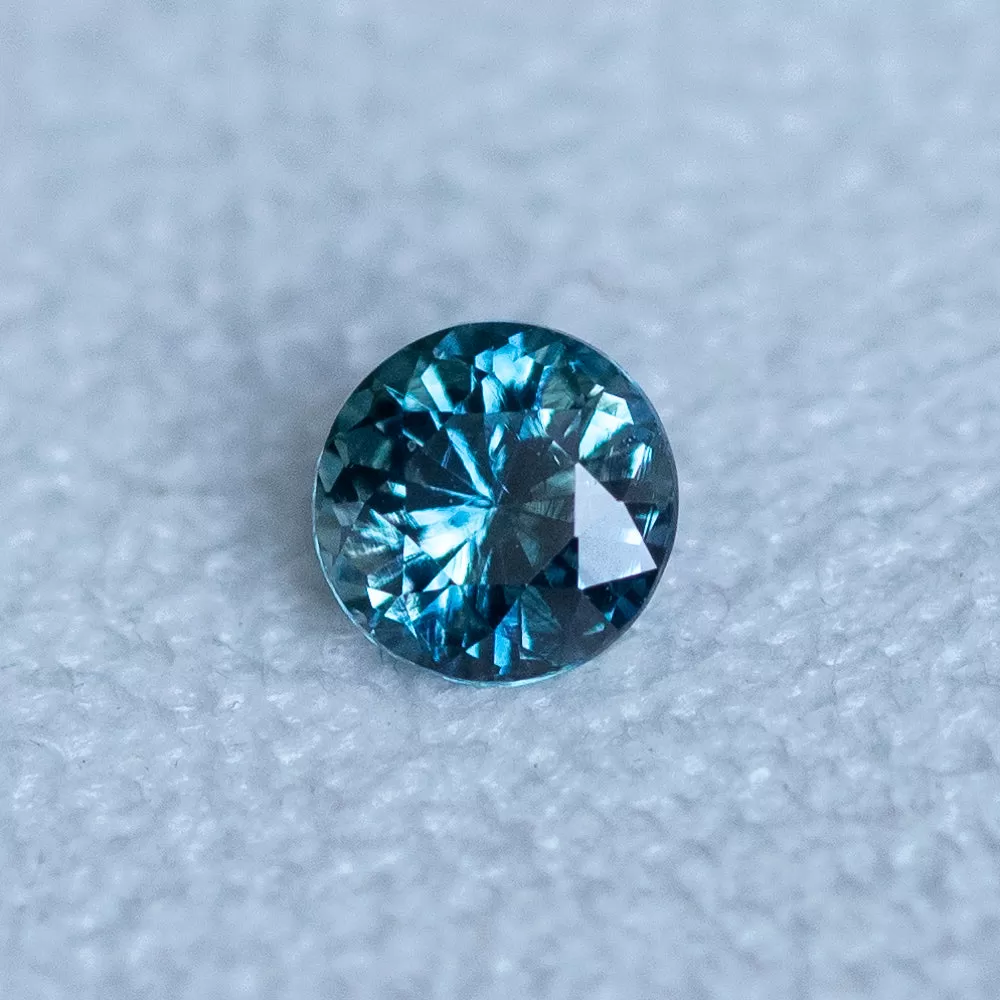 0.93CT ROUND MADAGASCAR SAPPHIRE, MEDIUM BLUE, 5.71X5.66X3.77MM, HEATED