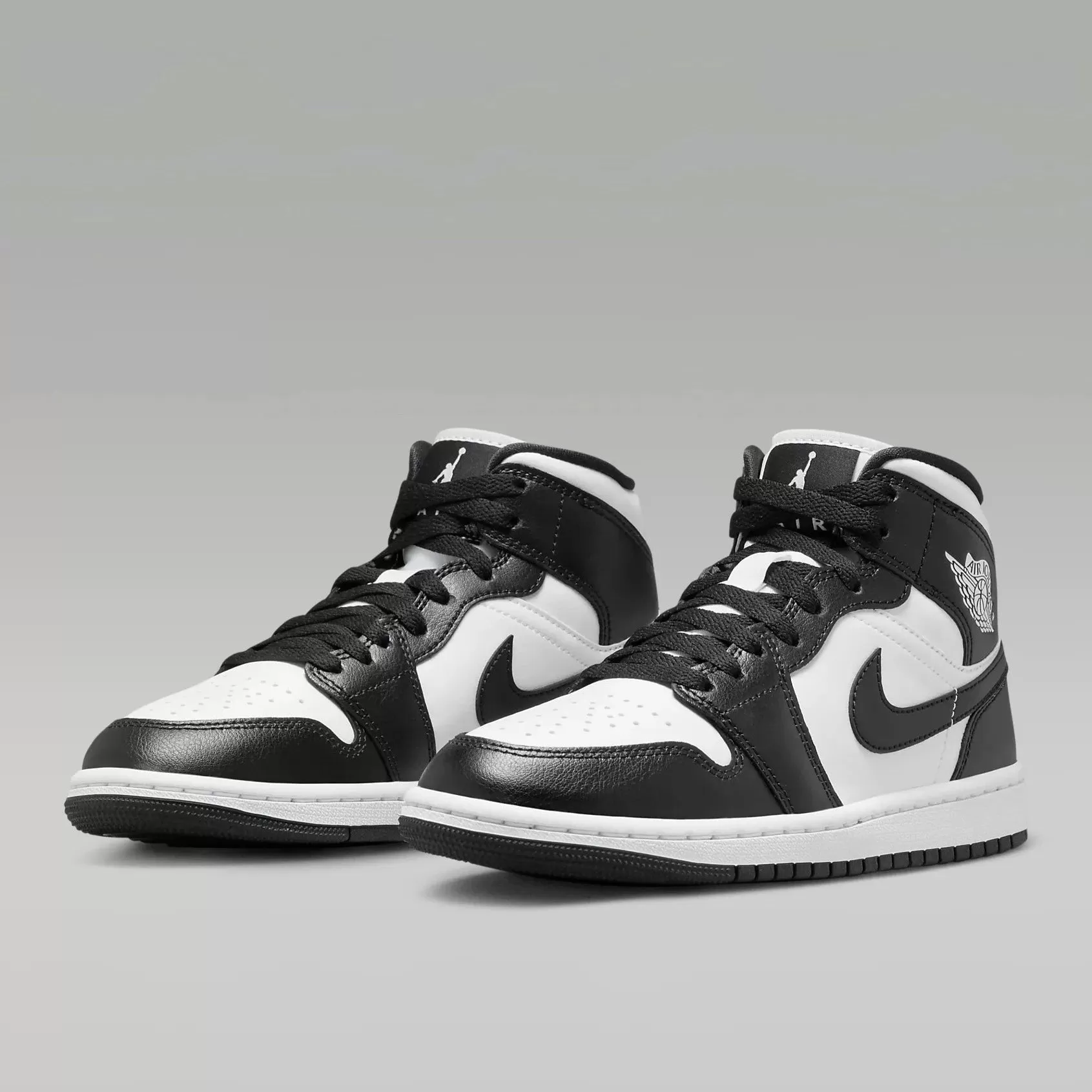 Limited Edition Air Jordan 1 Women Mid (Black/White)