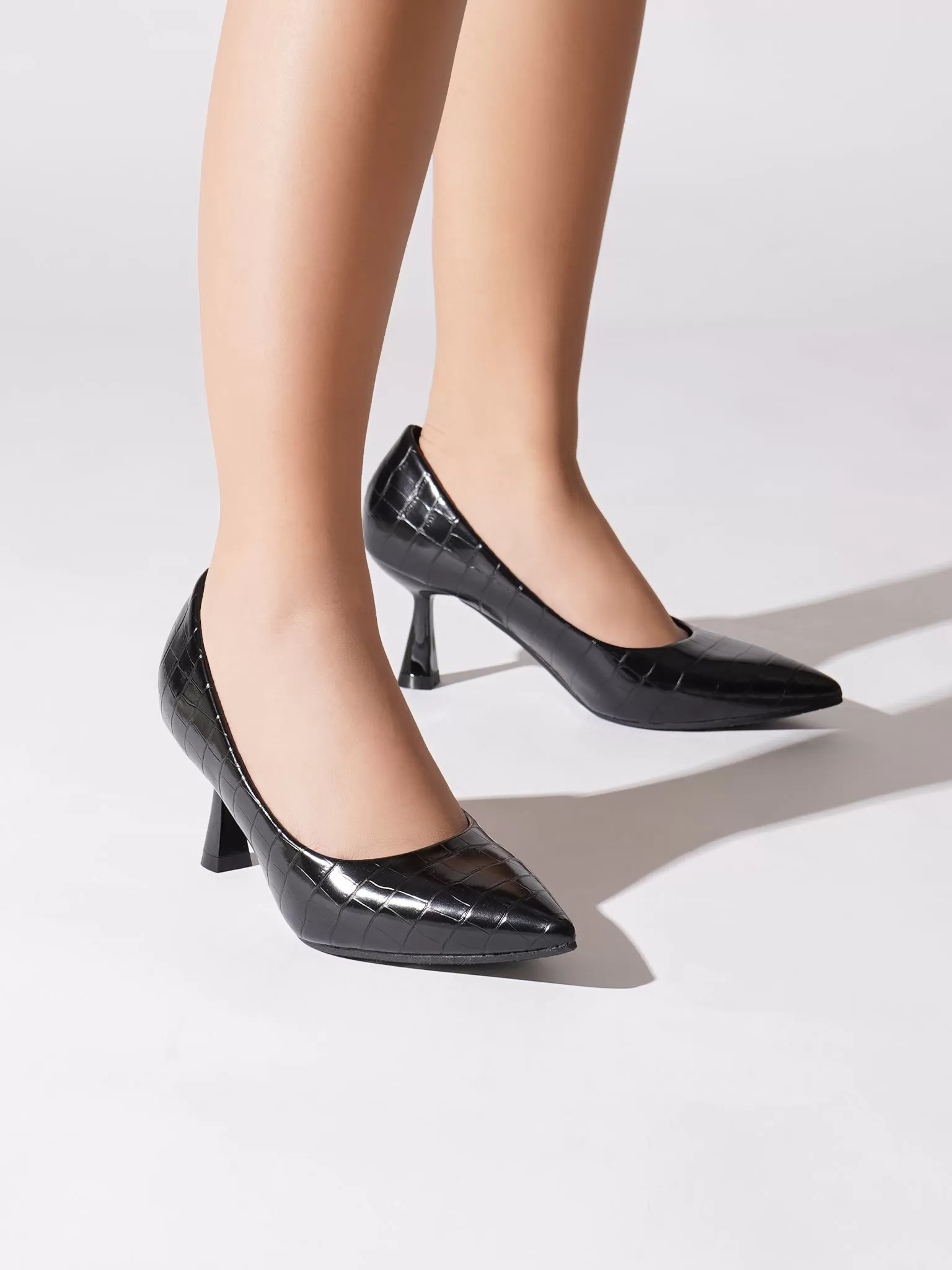 Palmer Heel Pumps